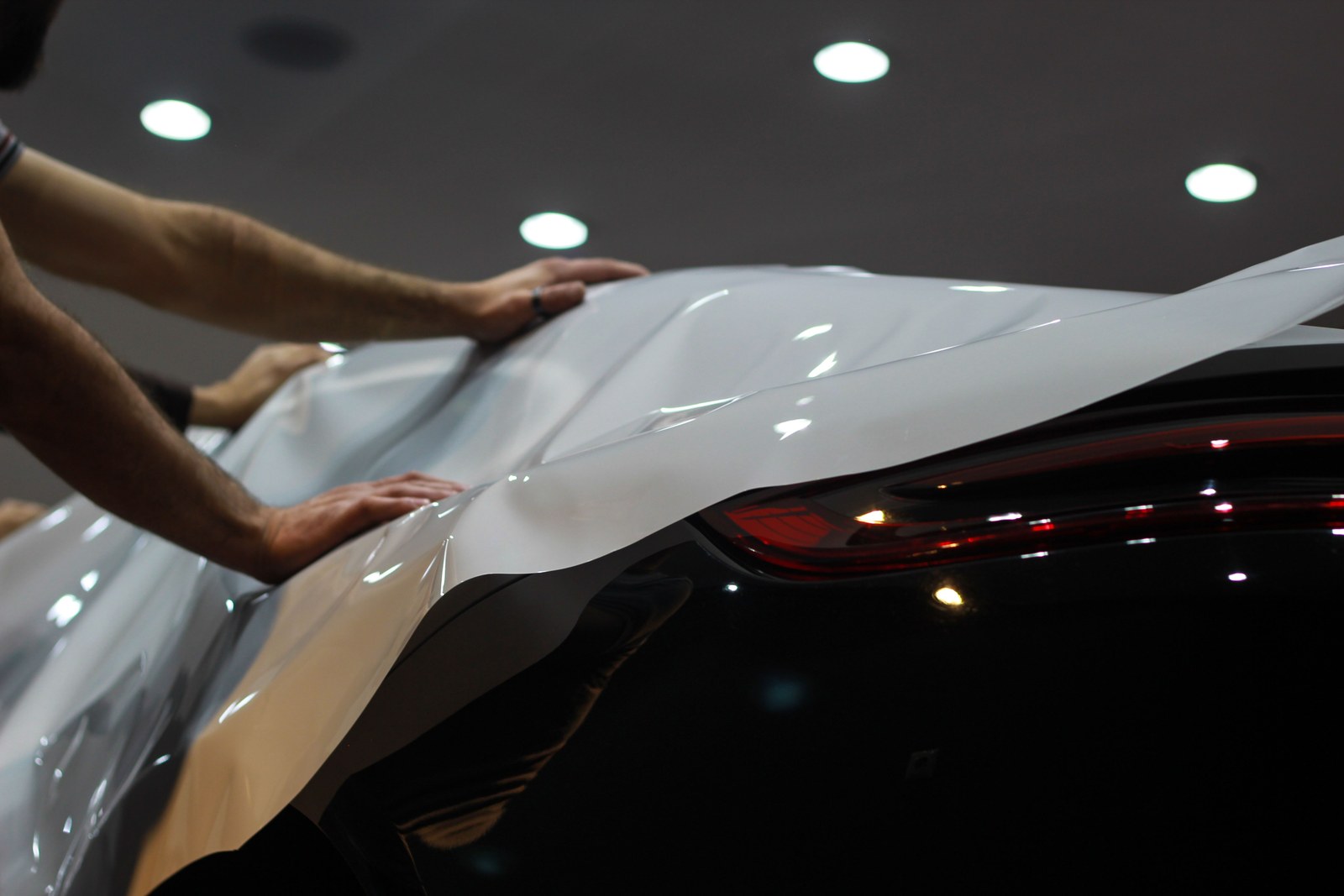 Window film being applied to glass